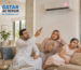 Frustrated family in Khalifa City Abu Dhabi facing AC not cooling issue inside modern villa, searching for AC repair near me