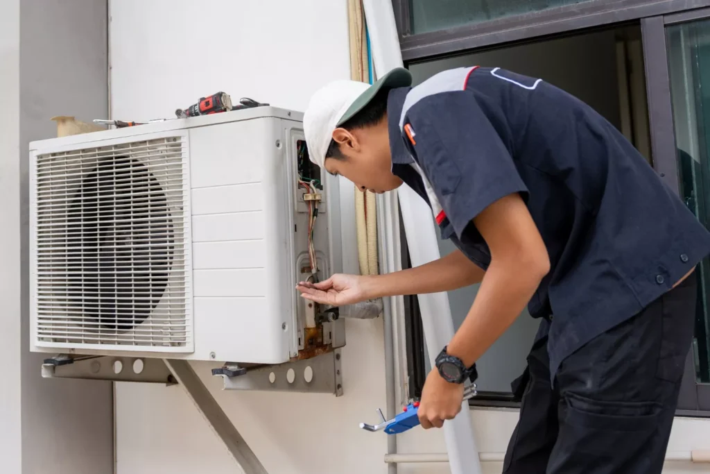 Professional technician providing best AC repair services in Abu Dhabi
