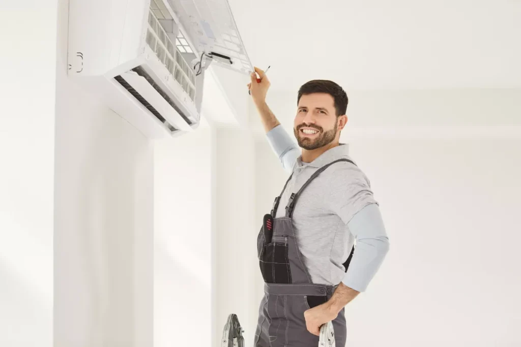 Skilled technician performing best AC repair services on split AC unit