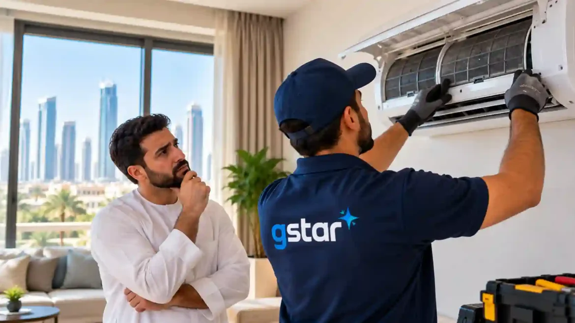 GSTAR technician checking an AC that is not cooling in Abu Dhabi
